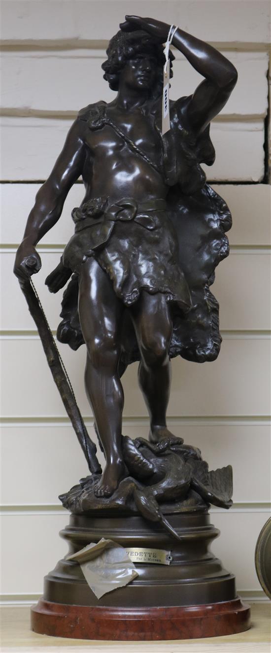After L. Moreau. A bronzed spelter figure of a hunter En Vedette